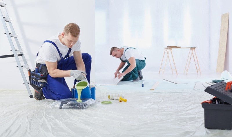 professionals preparing to color a commercial space